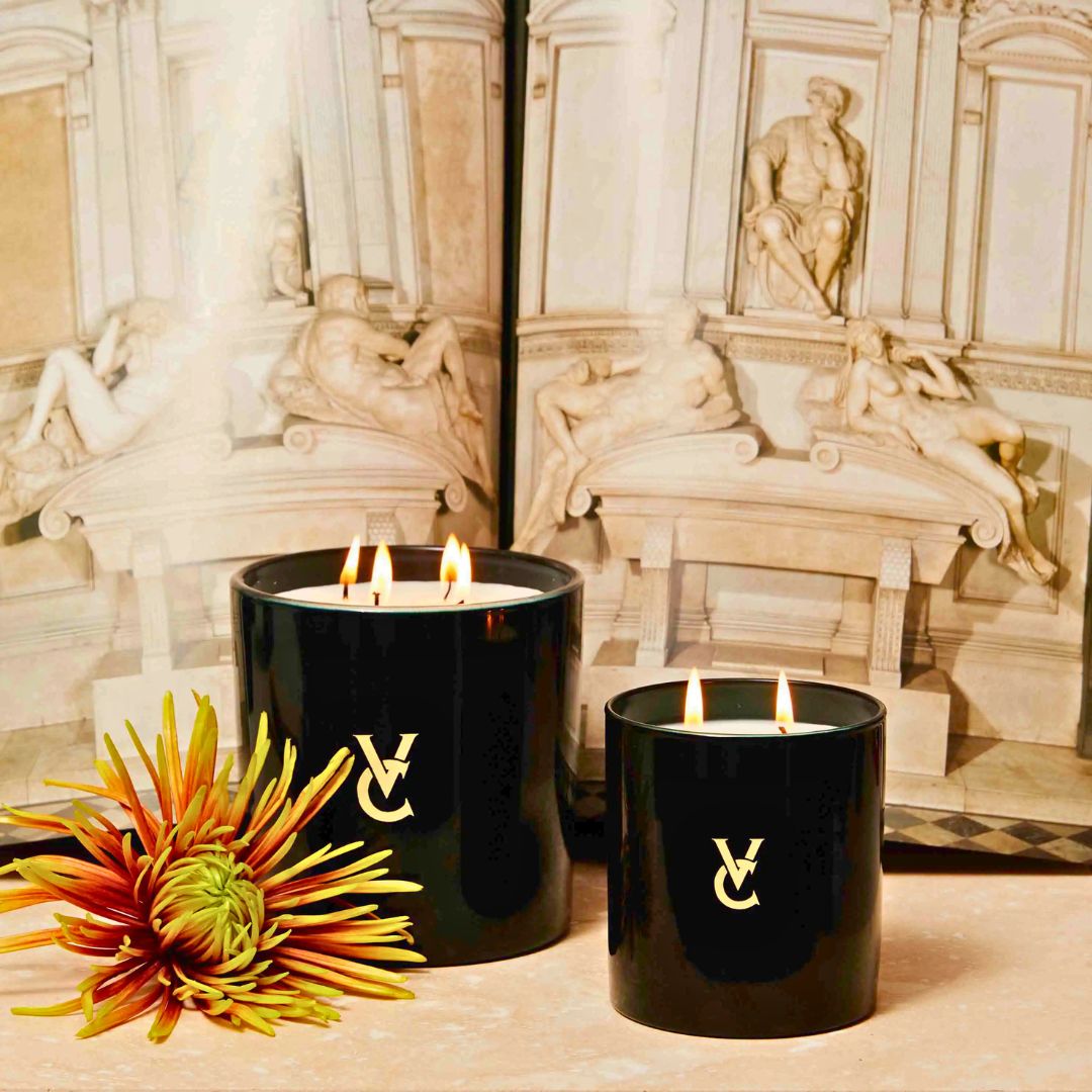 Luxury candles with a rich leather, tobacco and warm smoky scent like Trudon's Ernesto with bergamot 